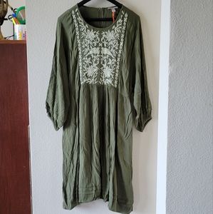 lady's dress with embroidery on the front